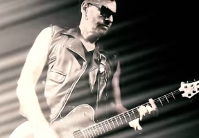 Watch: Bauhaus’ Daniel Ash makes new video for 2009 solo rocker ‘Flame On’